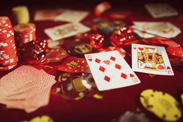 A man focused on his laptop with live stats in the background, highlighting the dedicated sports and gaming features of the D63 mobile app.