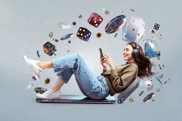 A woman smiling by bright slot machines showing lucky symbols, showcasing the exciting slot offerings at D63.